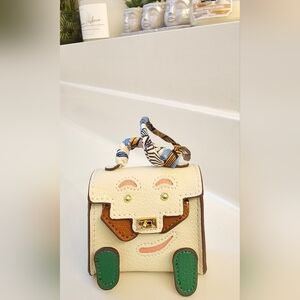 Stylish Cream Bag Charm